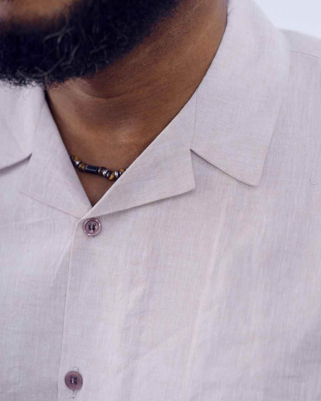 Beige and Off-white two-piece Cuban collar shirt paired with palazzo pants 2