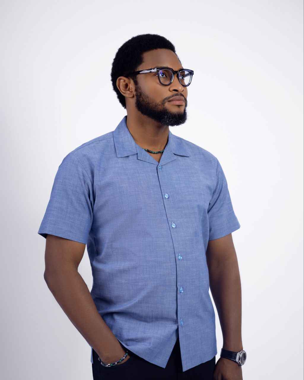 Blue and Black two-piece Cuban collar shirt paired with casual pants 3